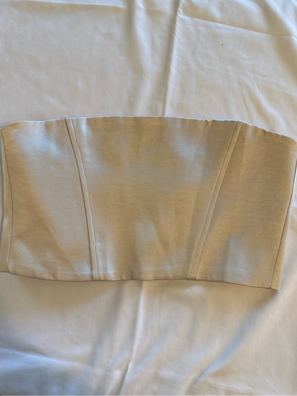 Zara Satin Corset Top in a cream/ecru color. It features a strapless silhouette,
